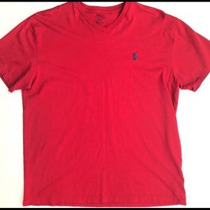 Red polo with blue logo